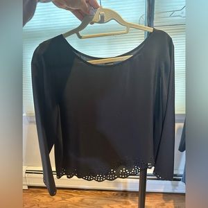 Club Monaco crop blouse with scalloped hem. 100% silk.